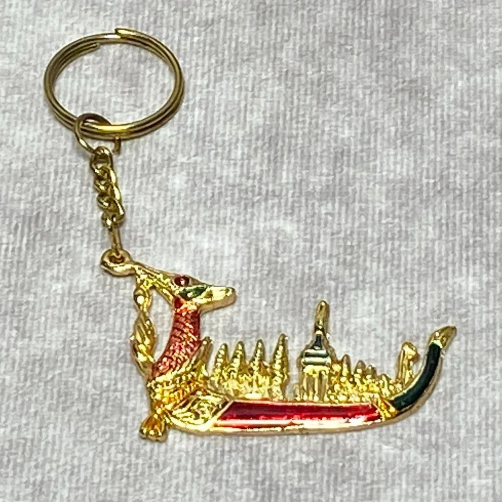 Golden Dragon Boat Keychain With Intricate Temple Design & Red/Green Details